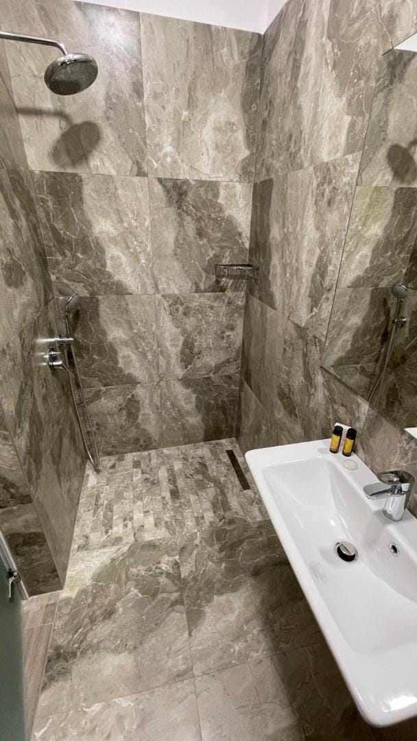 Shower and basin in marble