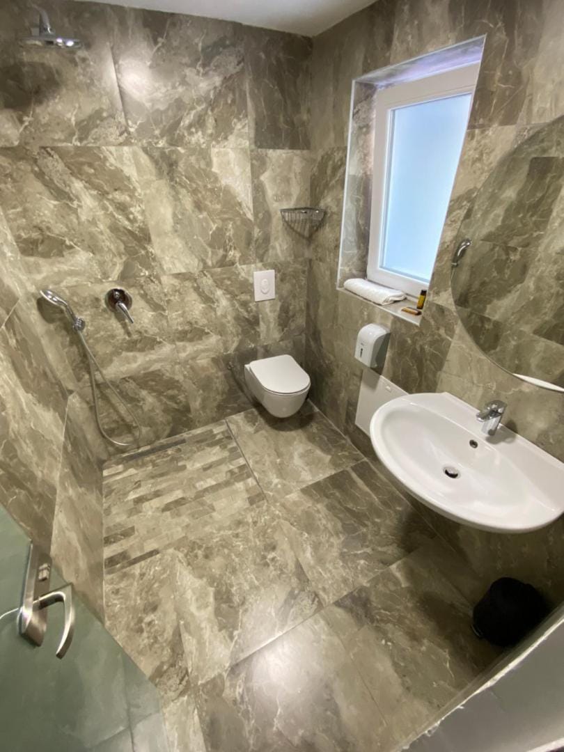 Basin and mirror in the bathroom