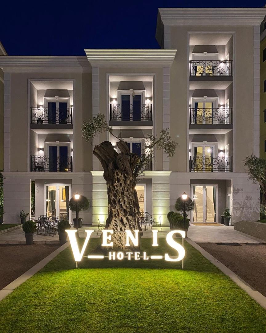 The hotel entrance at night