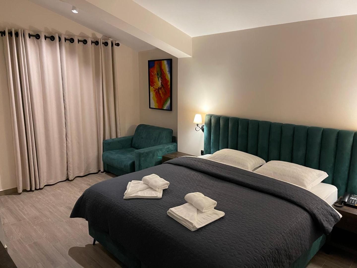 Double bed with towels laid out