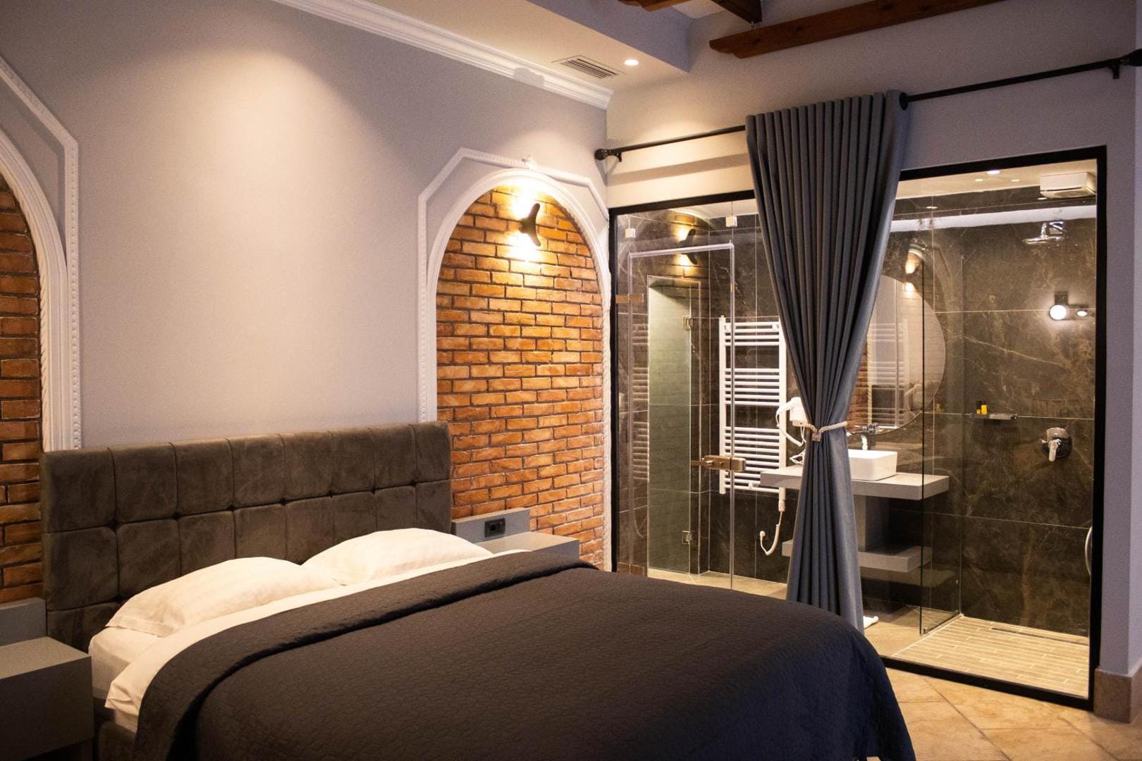 Bed and the glass shower